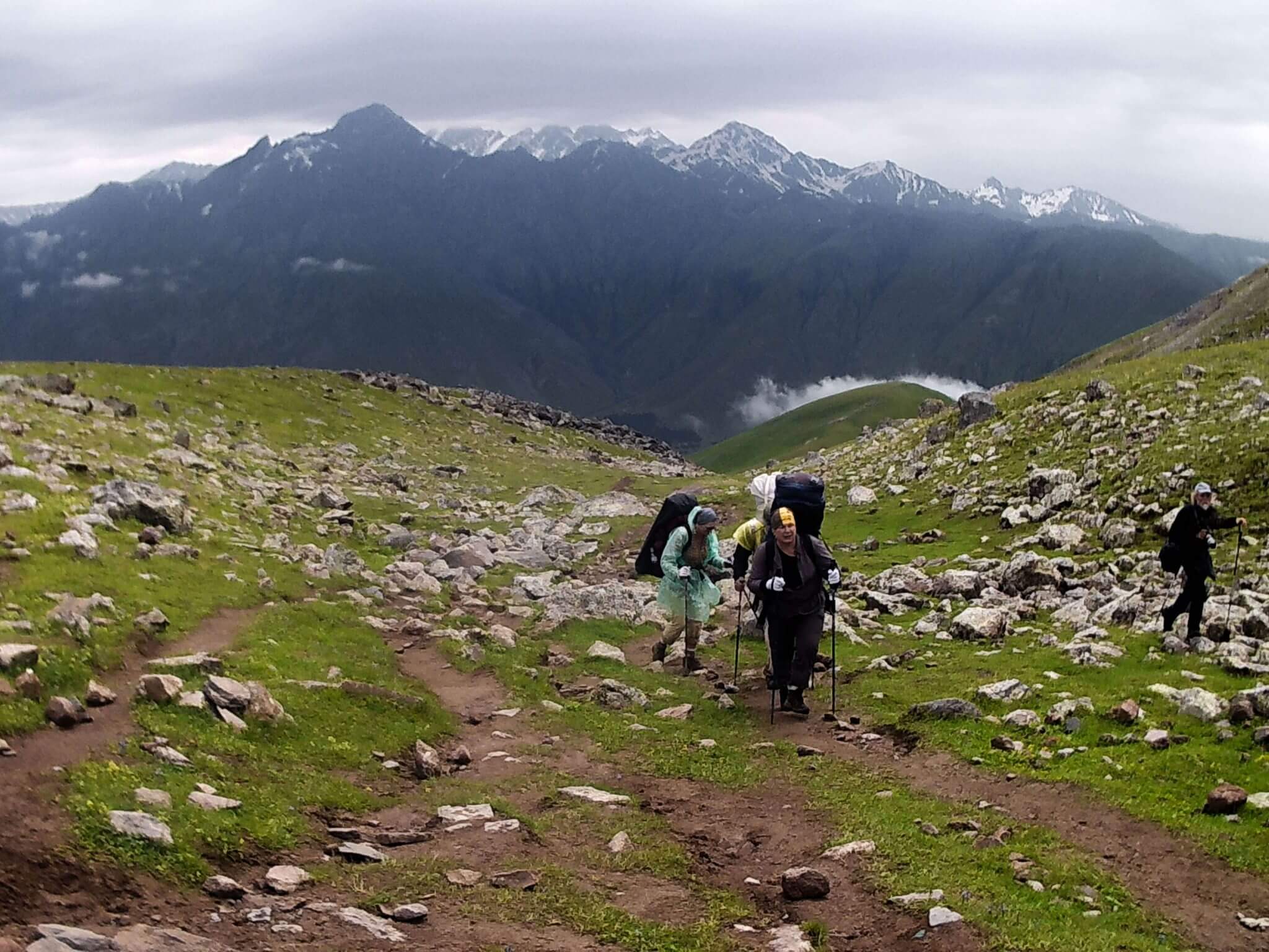 climbers caucasus mountains kazbegi georgia