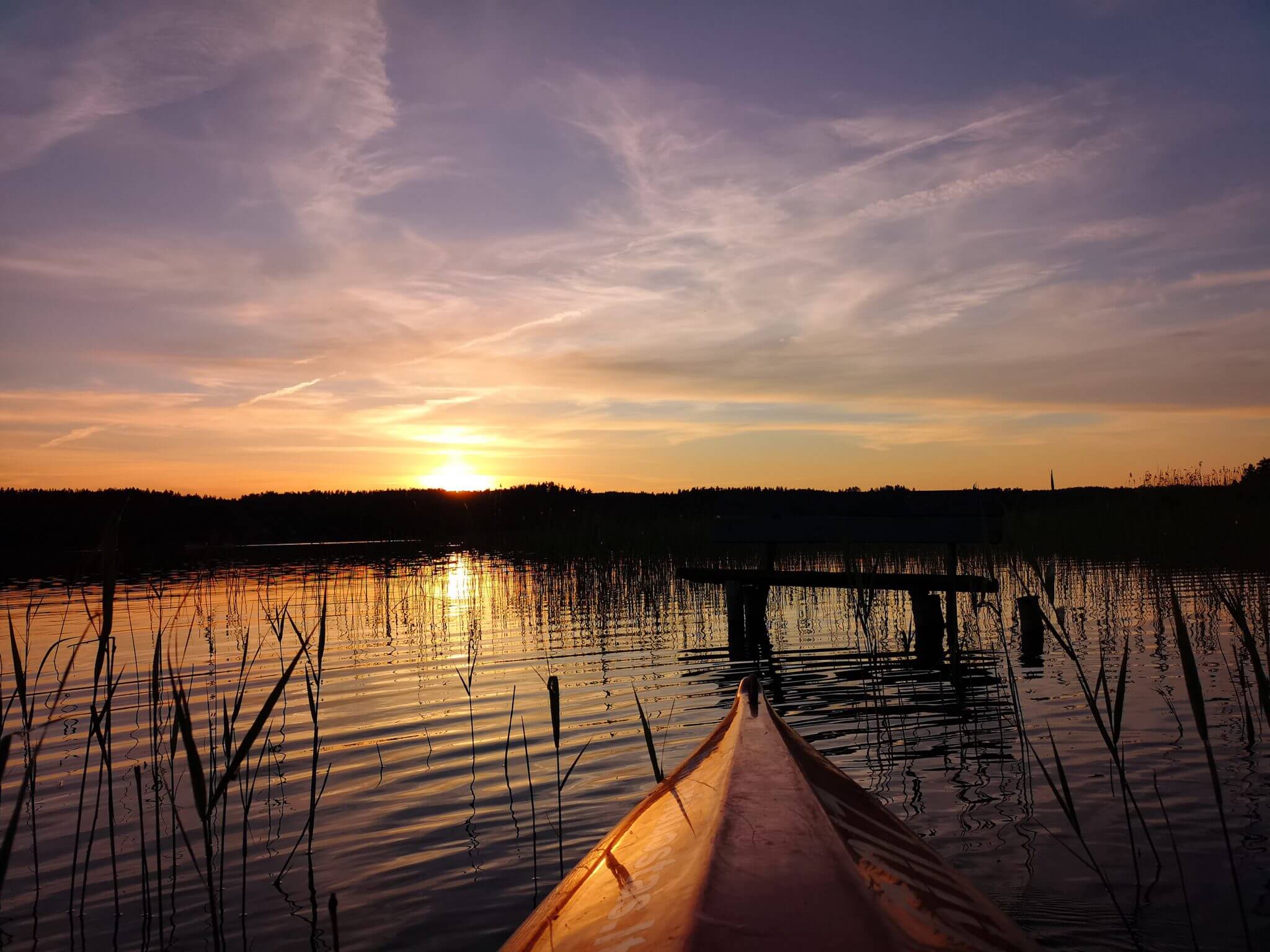 sunset from a kayak in lake almajas