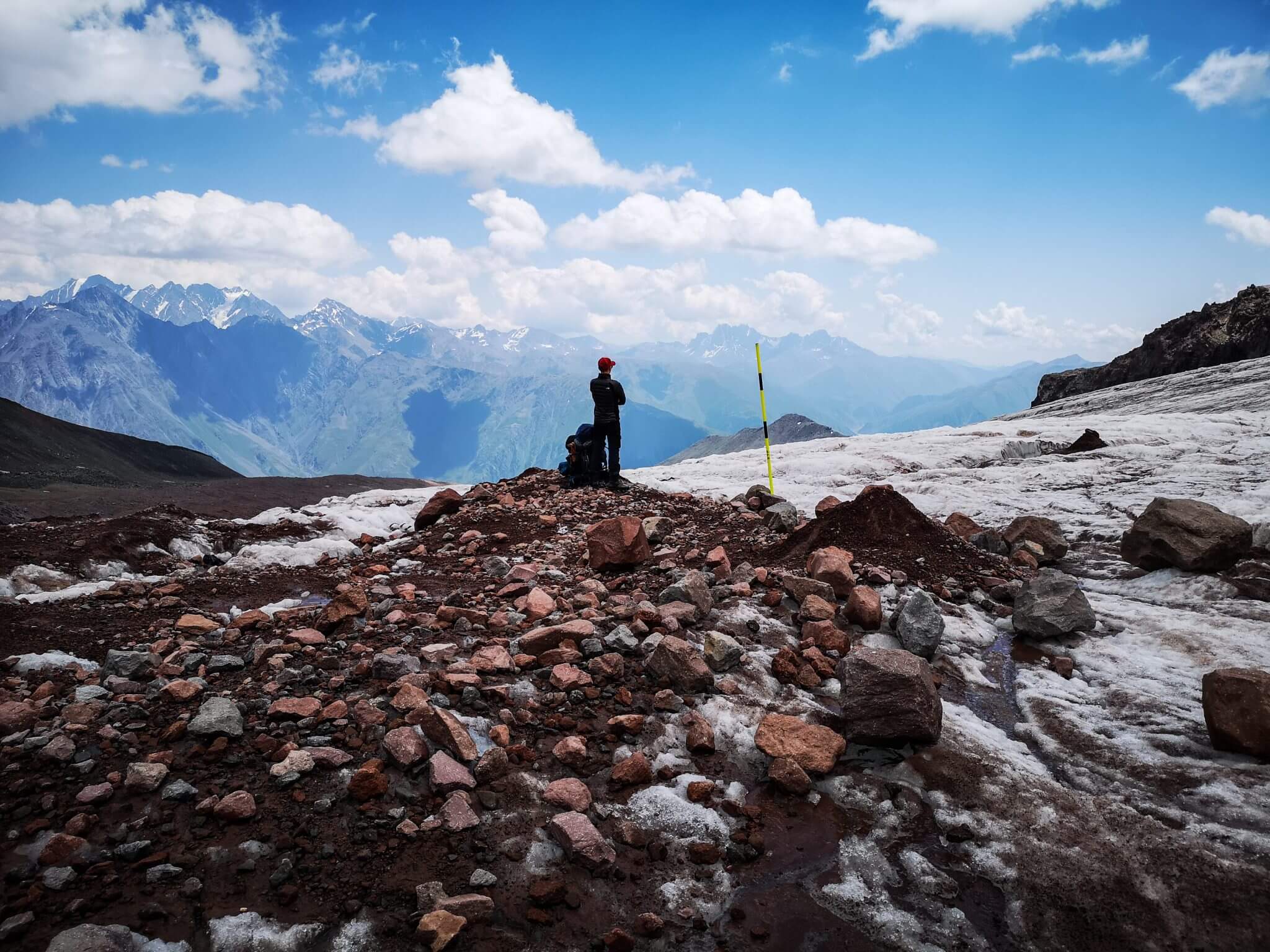 climber watching mountain panorama