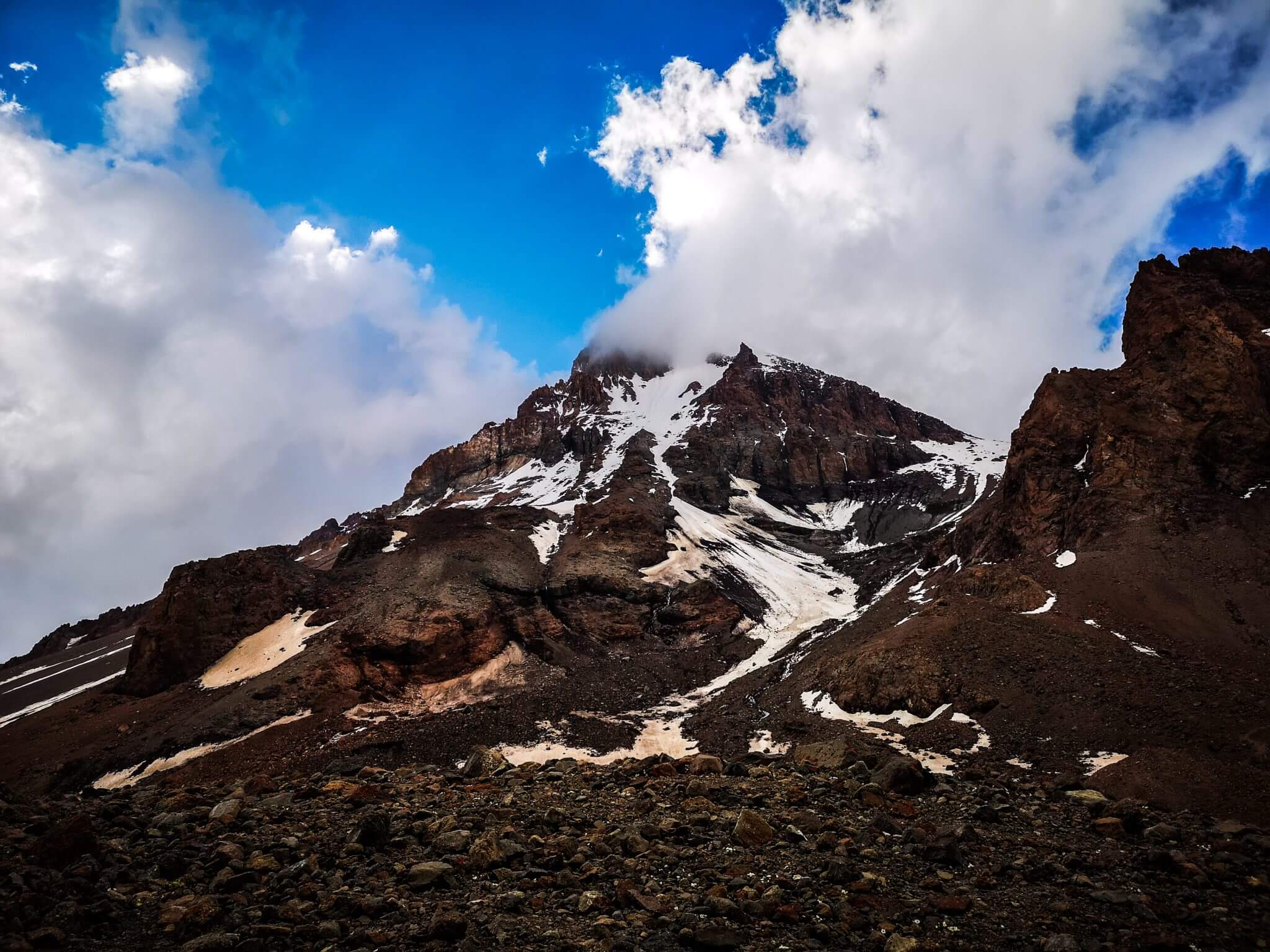 cloud coming from peak mount kazbek