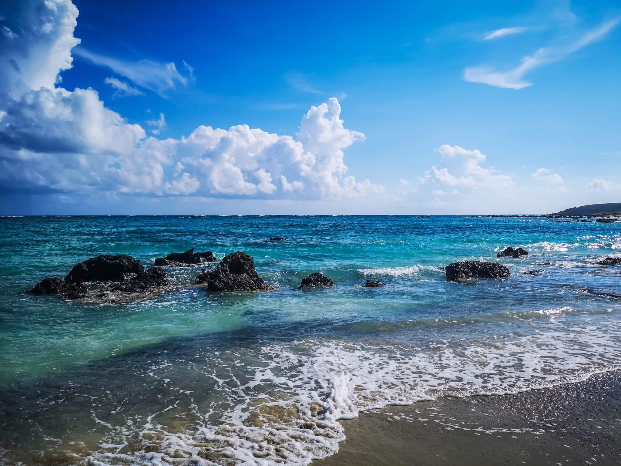 stones in sea near elafonisi lagoon