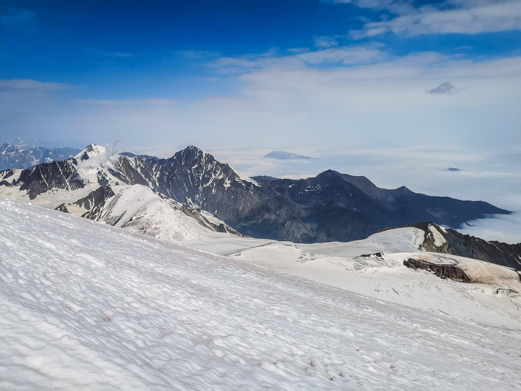 caucasus mountains peaks risen out of clouds