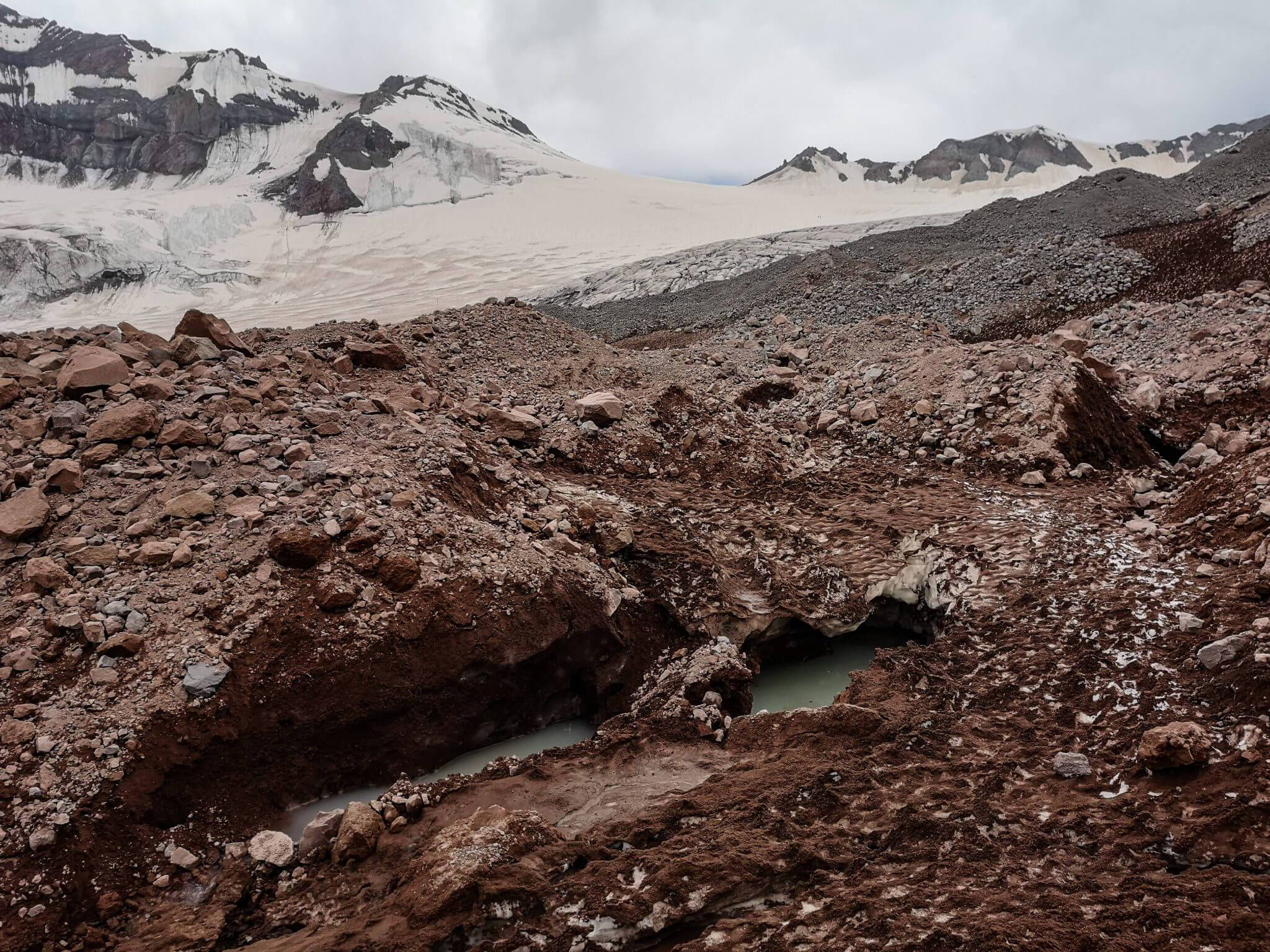 melt water mountain stream erosion