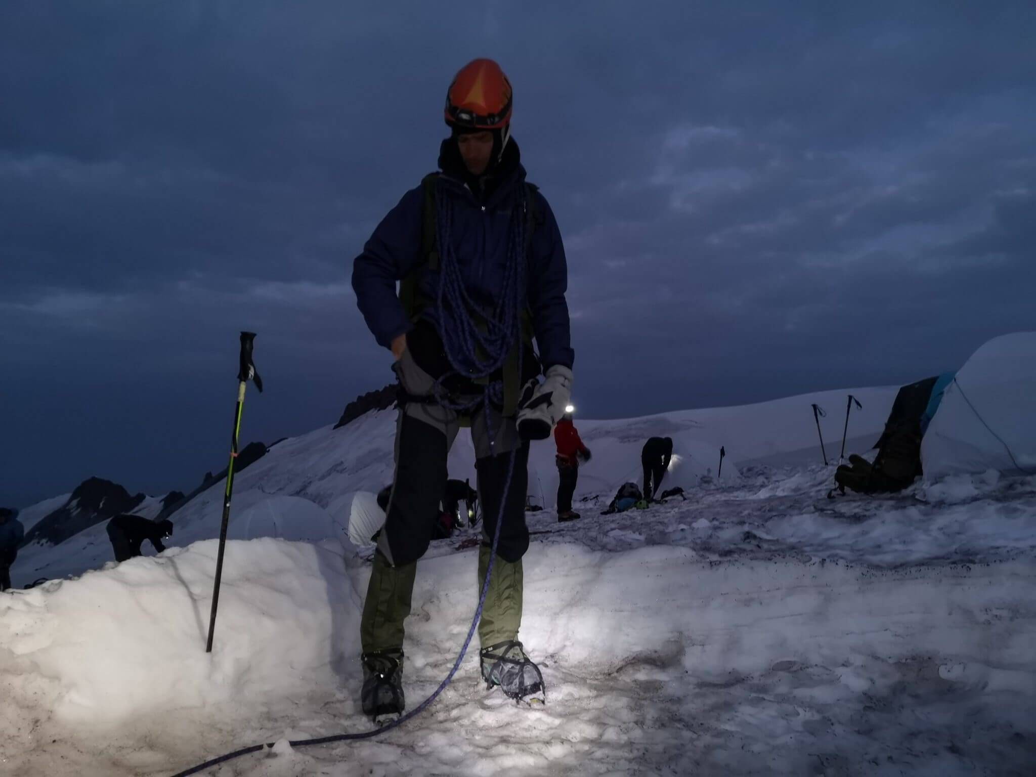 mountain climber in a snow camp during a dawn
