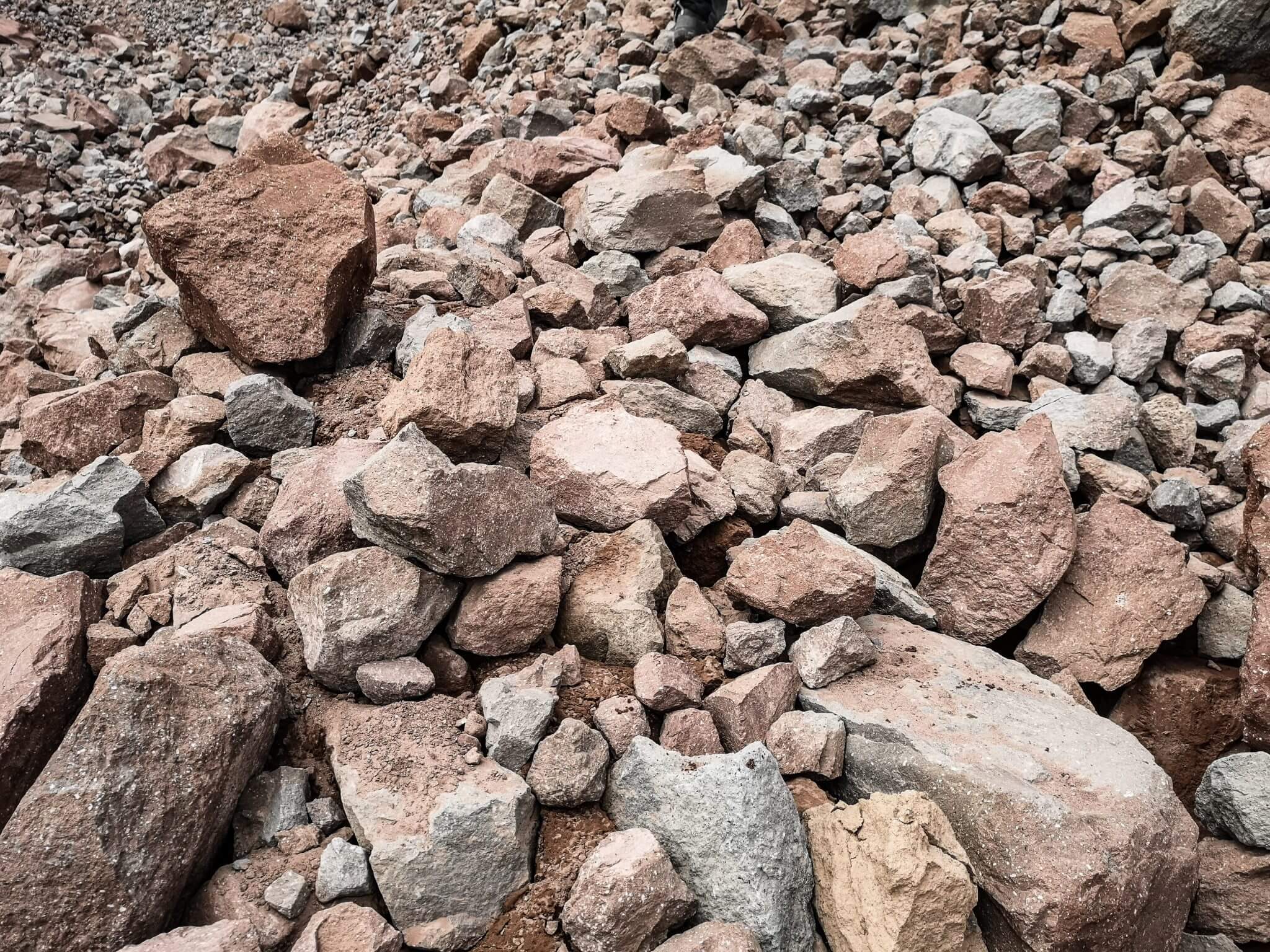 walking in mountains on rocks