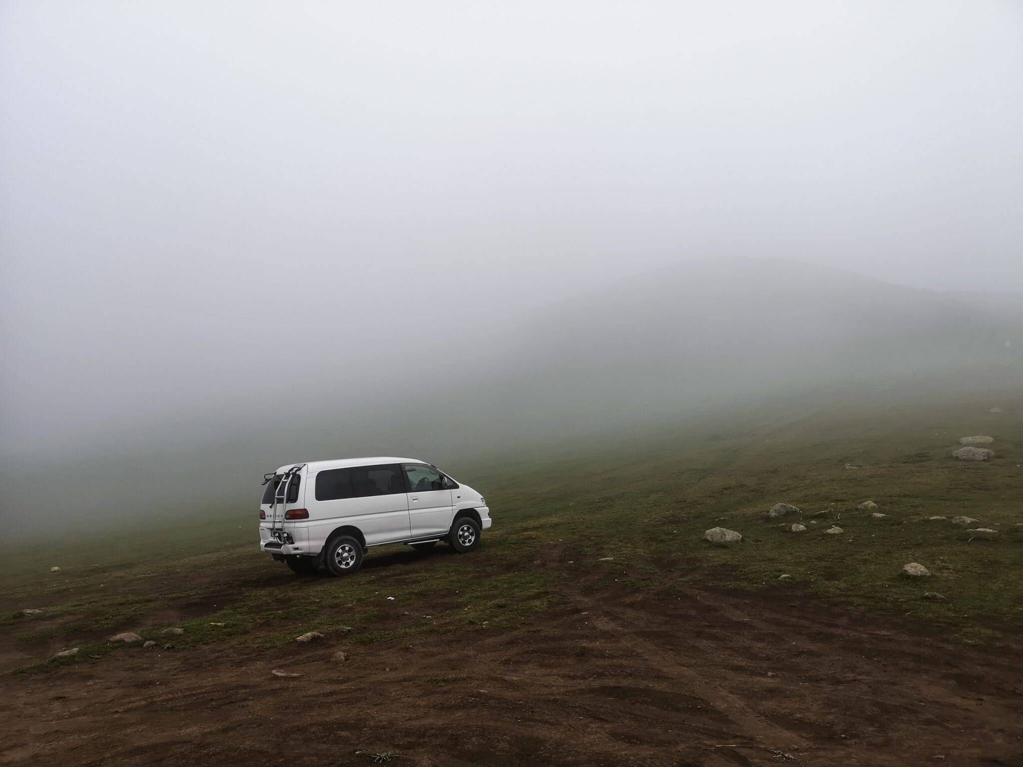 caucasian taxi covered by clouds
