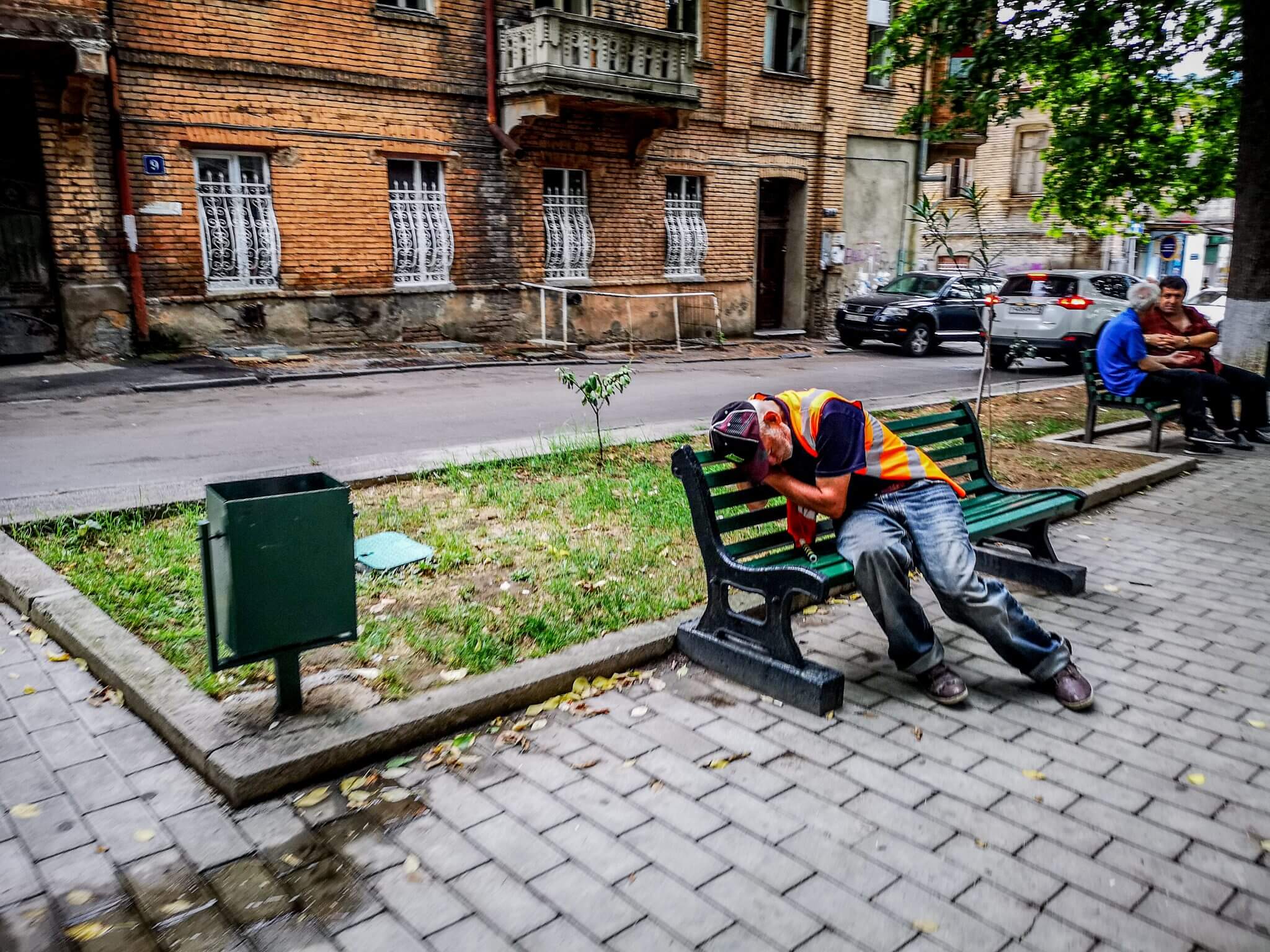 georgia capital tbilisi man sleeping