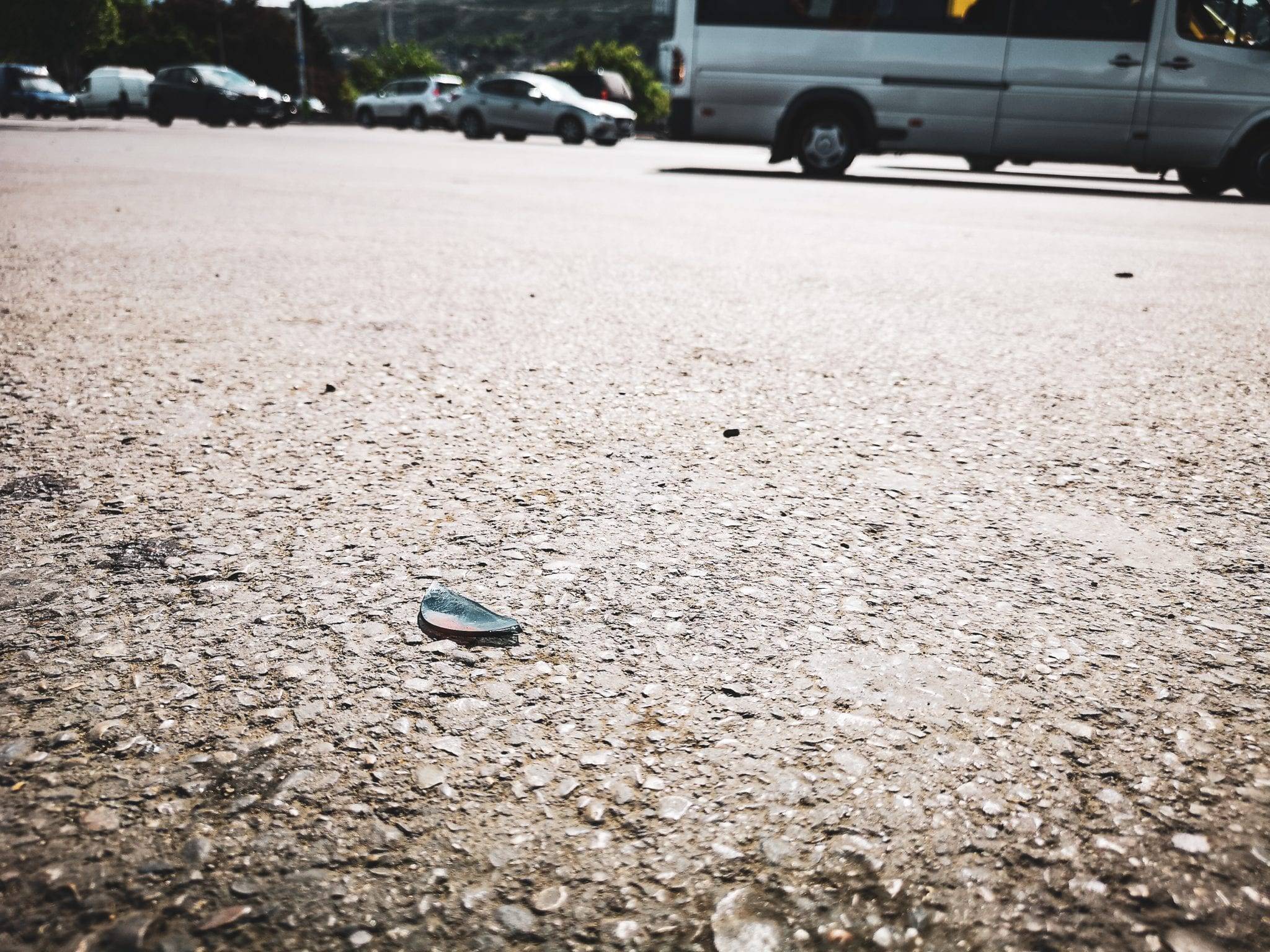 bloody piece of glasses on ground
