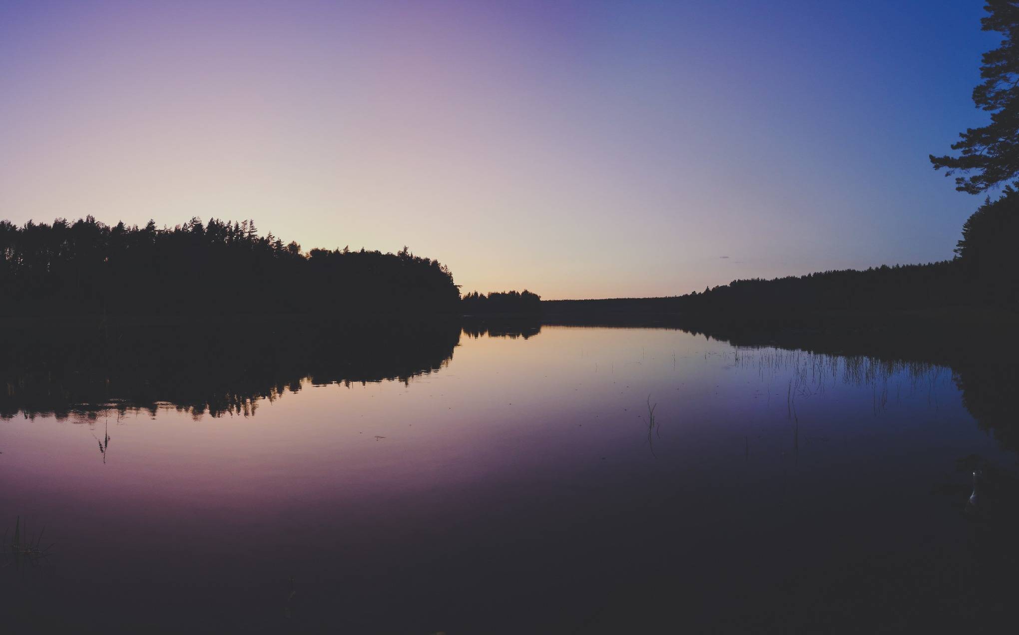 Black Lakajai Lake during a night in Labanoras Regional Park, Lithuania