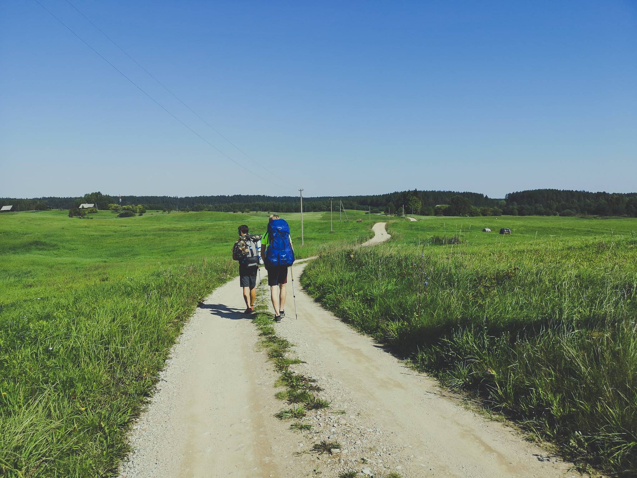 Walking through country side near Lakajai Lakes in Labanoras regional Park, Lithuania