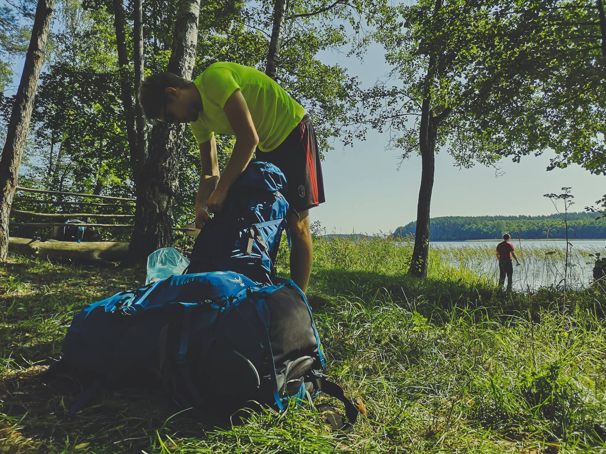 Packing trekking backpack in Labanoras Regional Park, Lithuania