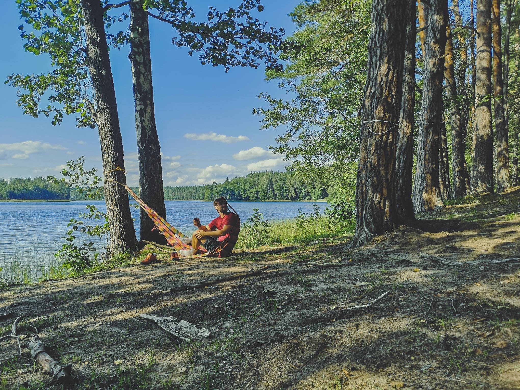 Setting up a camp near Black Lakajai lake in Labanoras Regional Park, Lithuania