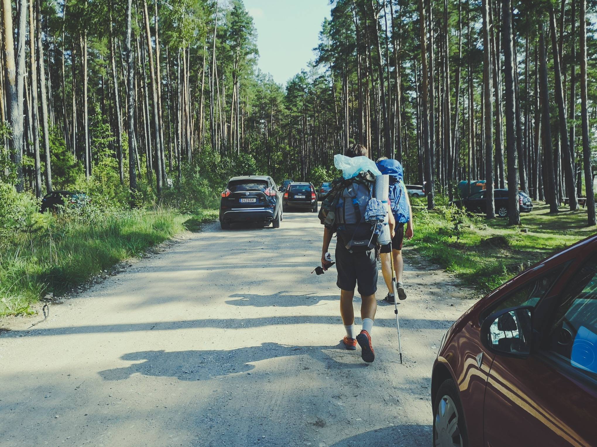 Trekking between cars in Labanoras Regional Park, Lithuania