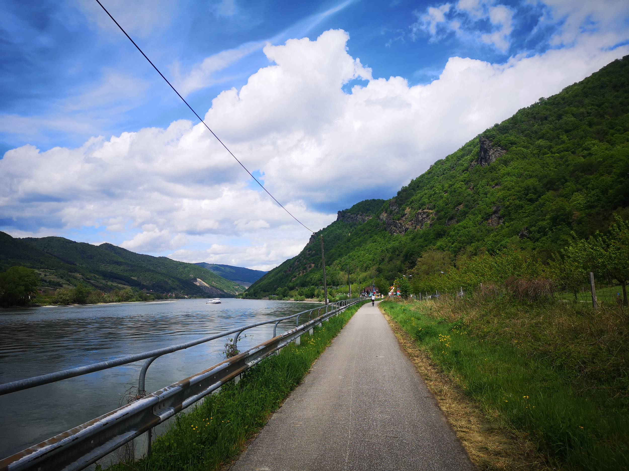 RIding a bike on the right side of Danube in Wachau Valley, Austria