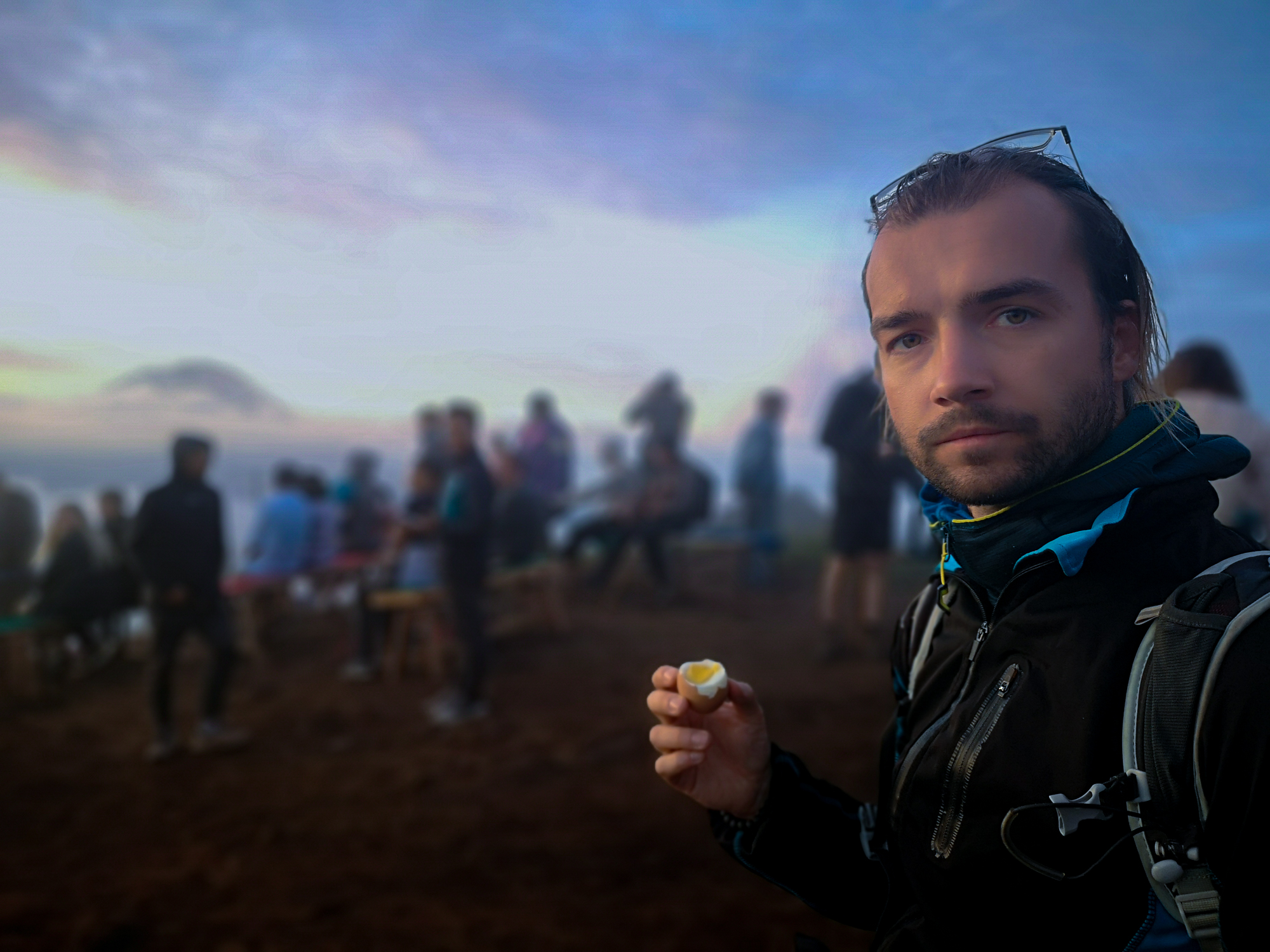 Eating egg on Mount Batur volcano, Bali